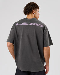 Man wearing Backline Washed Heavyweight Oversized Tee - Asphalt Washed | Model:Leandro | Size:M | Thumbnail Index: 0