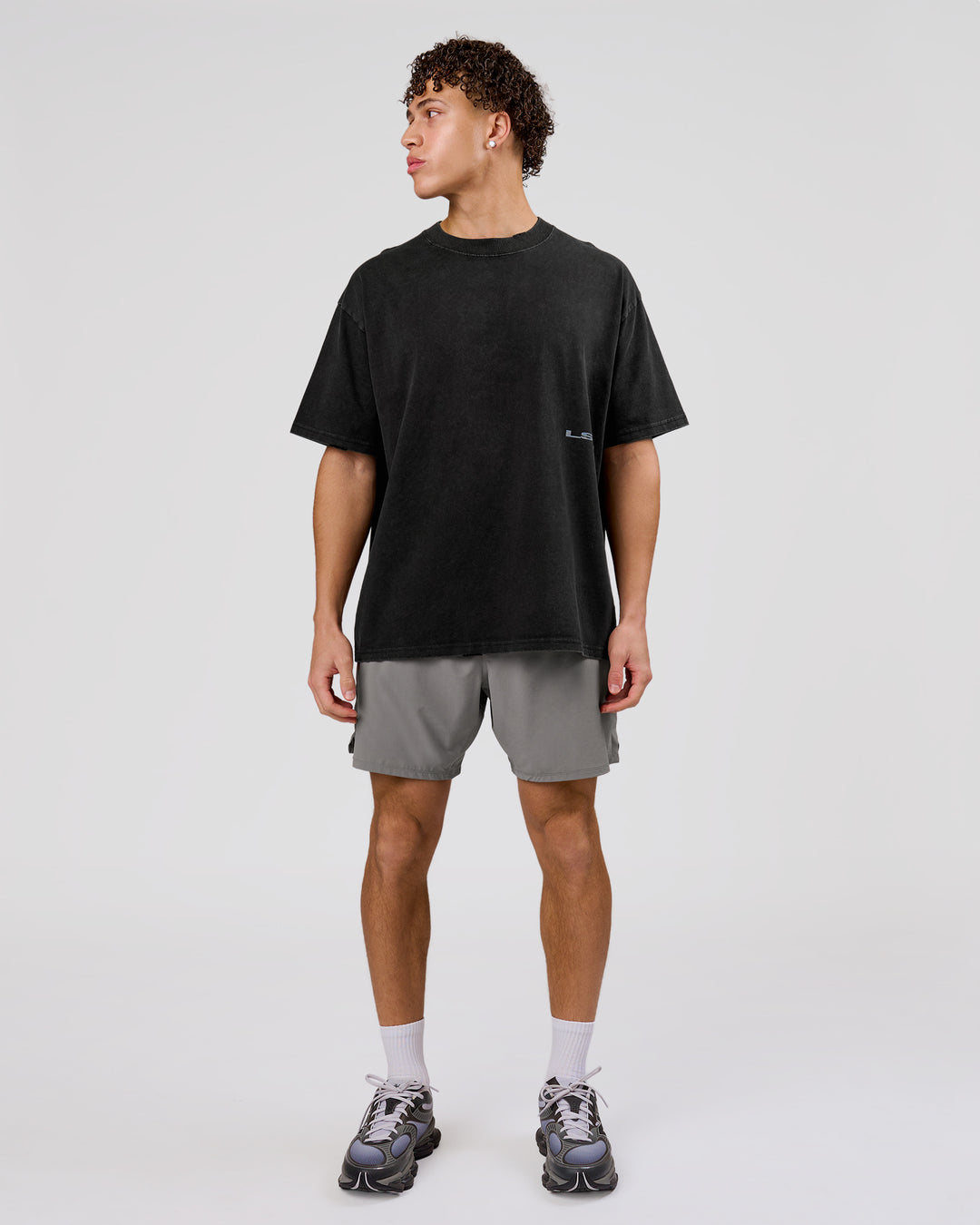Man wearing Backline Washed Heavyweight Oversized Tee - Black Washed | Model:Leandro | Size:M - view 6