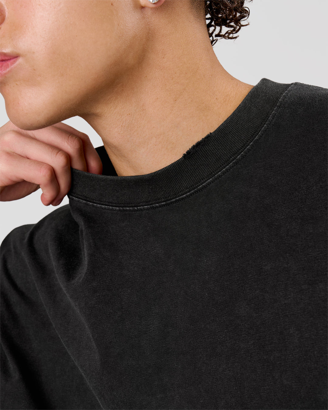 Man wearing Backline Washed Heavyweight Oversized Tee - Black Washed | Model:Leandro | Size:M - view 12