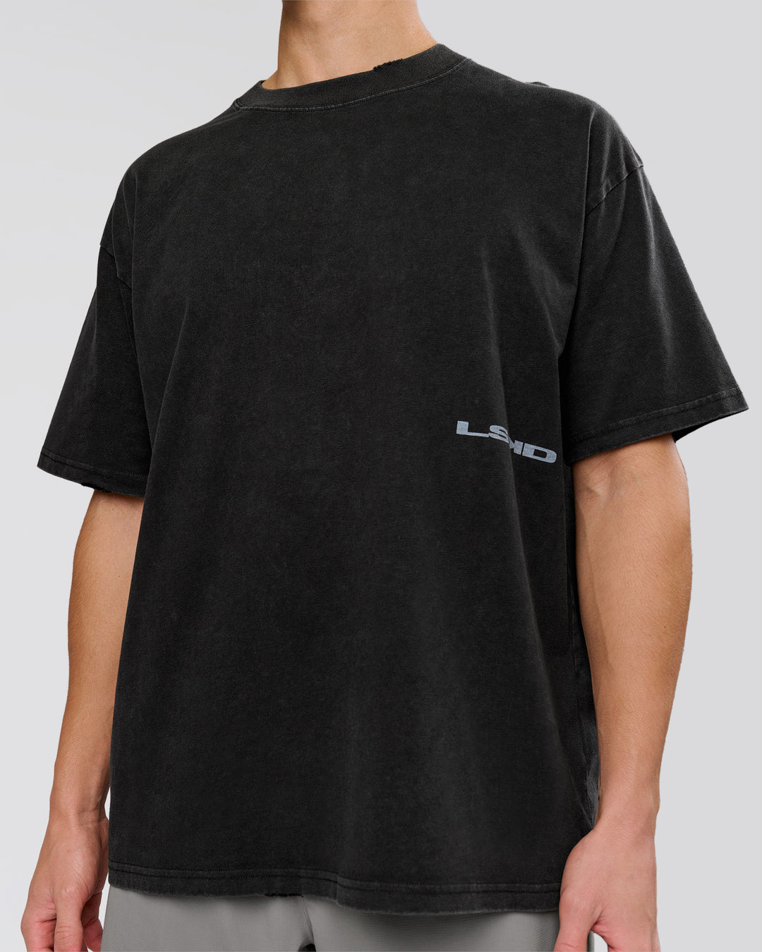Man wearing Backline Washed Heavyweight Oversized Tee - Black Washed | Model:Leandro | Size:M - view 14