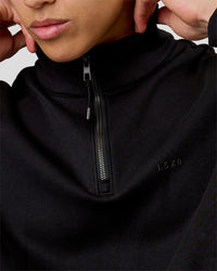 Man wearing Base Quarter Zip Sweater - Black | Model:Leandro | Size:M | Thumbnail Index: 11