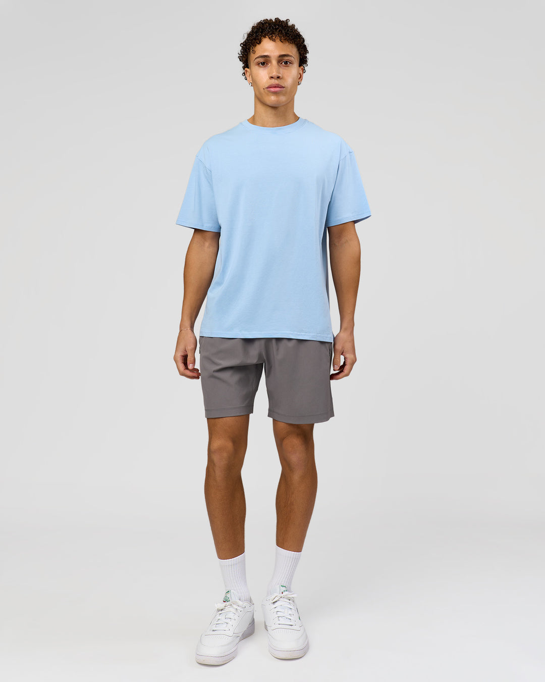 Man wearing Benchmark FLXCotton Oversized Tee - Open Air-Blue Bell | Model:Leandro | Size:M - view 7
