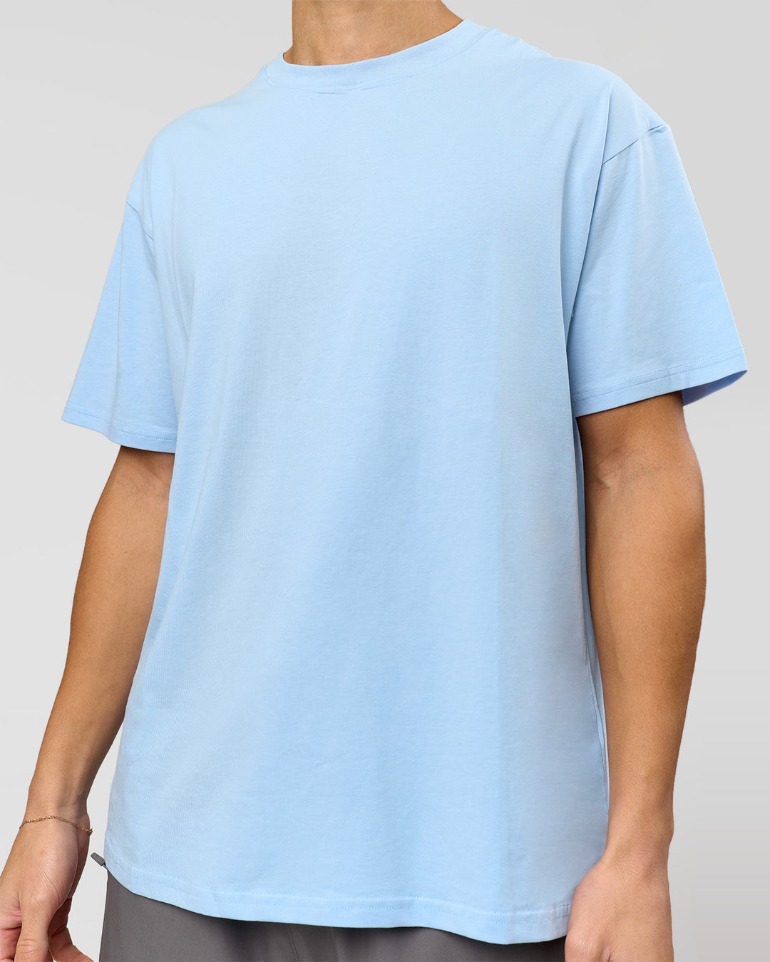 Man wearing Benchmark FLXCotton Oversized Tee - Open Air-Blue Bell | Model:Leandro | Size:M - view 14