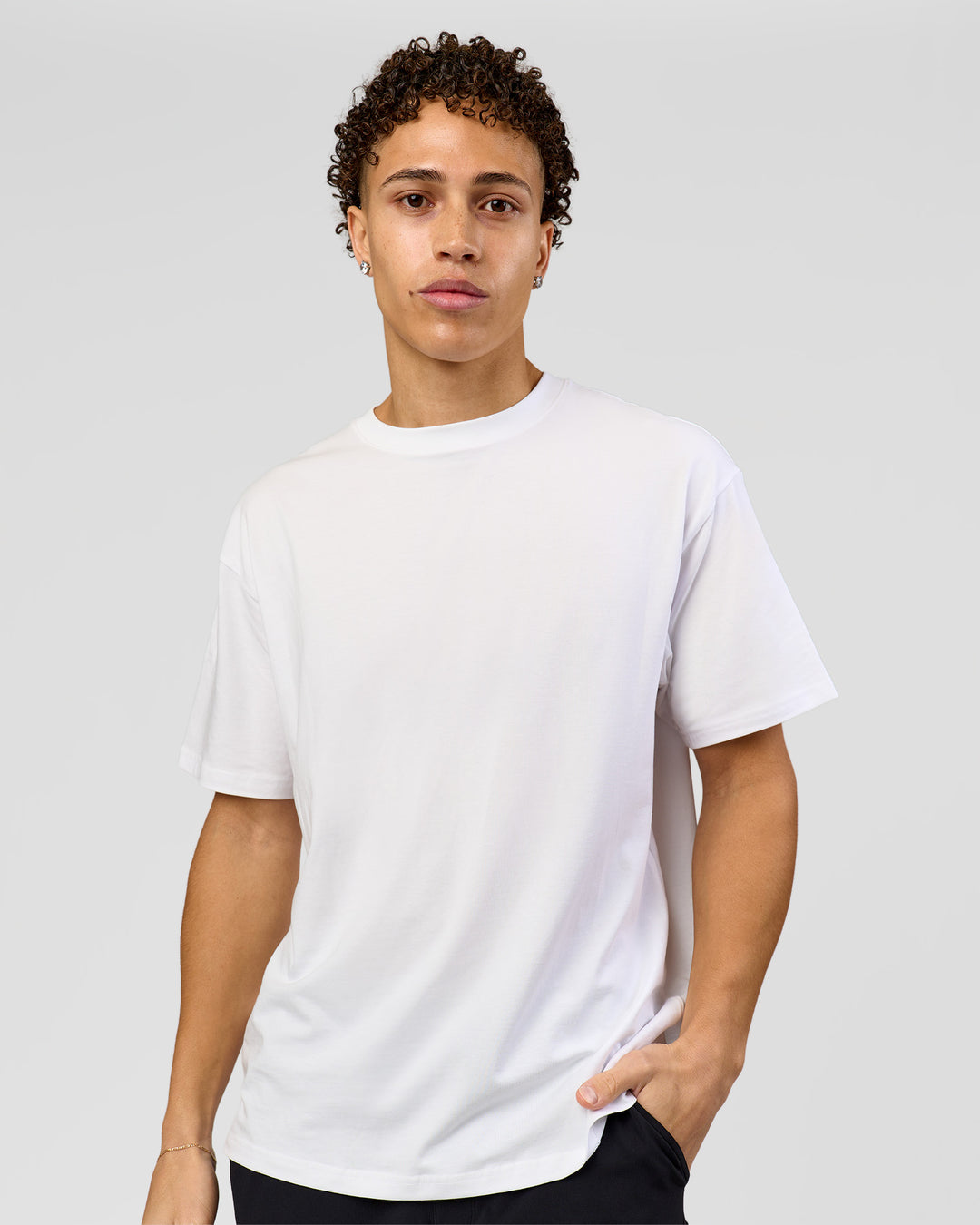 Man wearing Benchmark FLXCotton Oversized Tee - White-Pale Lilac | Model:Leandro | Size:M - view 5