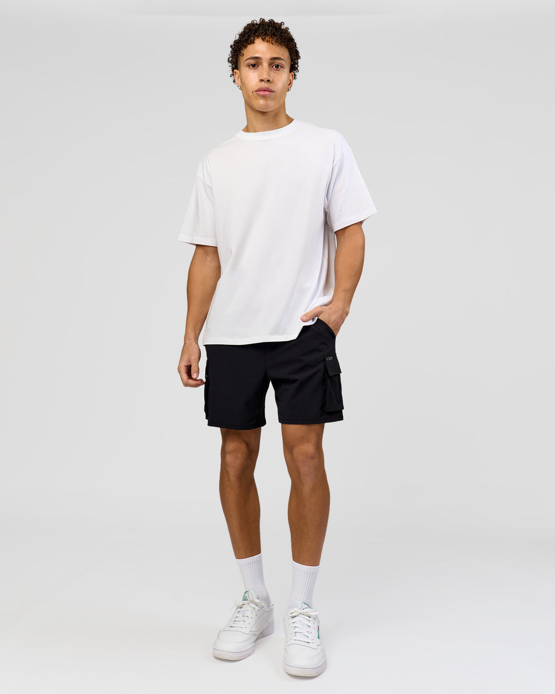 Man wearing Benchmark FLXCotton Oversized Tee - White-Pale Lilac | Model:Leandro | Size:M - view 17