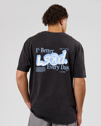 Man wearing Blended FLXCotton Oversize Tee  - Black Washed | Model:Leandro | Size:M | Thumbnail Index: 1