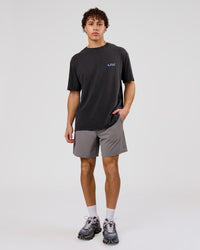 Man wearing Blended FLXCotton Oversize Tee  - Black Washed | Model:Leandro | Size:M | Thumbnail Index: 11