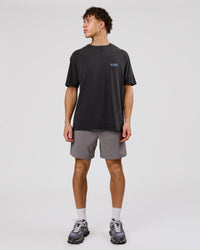 Man wearing Blended FLXCotton Oversize Tee  - Black Washed | Model:Leandro | Size:M | Thumbnail Index: 15