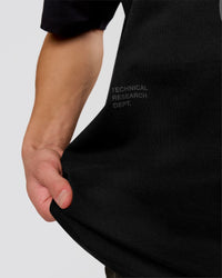 Man wearing Game Plan Heavyweight FLXCotton Oversized Tee - Black | Model:Leandro | Size:M | Thumbnail Index: 15