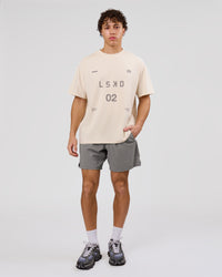 Man wearing Game Plan Heavyweight FLXCotton Oversized Tee - Vanilla Bean | Model:Leandro | Size:M | Thumbnail Index: 4