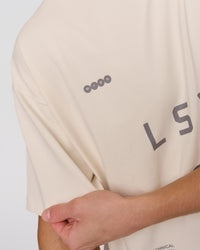 Man wearing Game Plan Heavyweight FLXCotton Oversized Tee - Vanilla Bean | Model:Leandro | Size:M | Thumbnail Index: 7