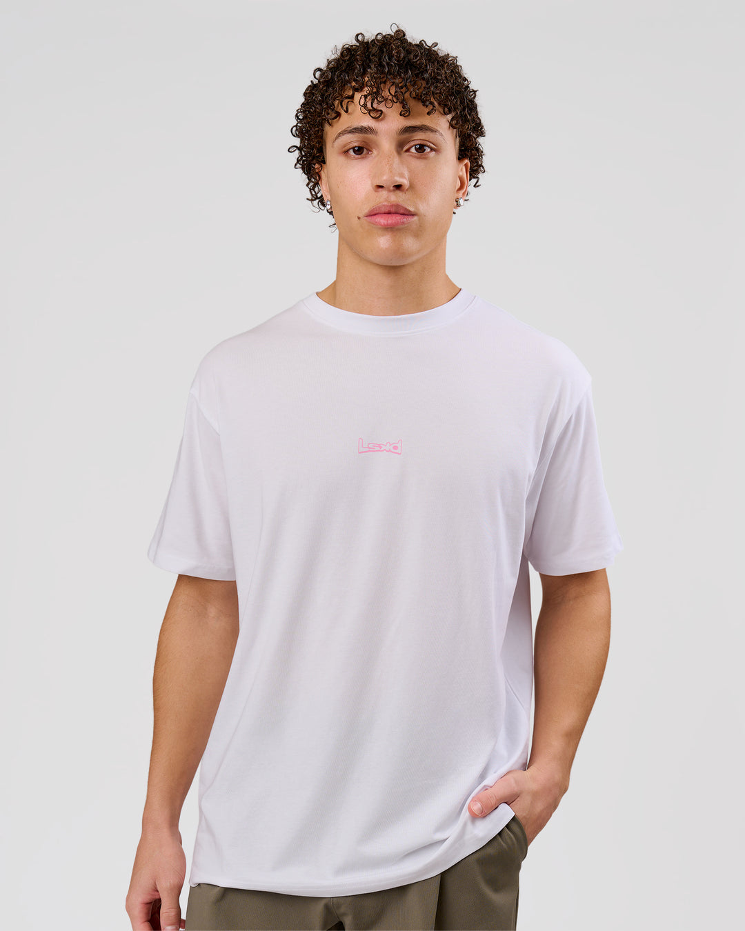Man wearing Magma FLXCotton Oversize Tee  - White-Pink Rose | Model:Leandro | Size:M - view 5