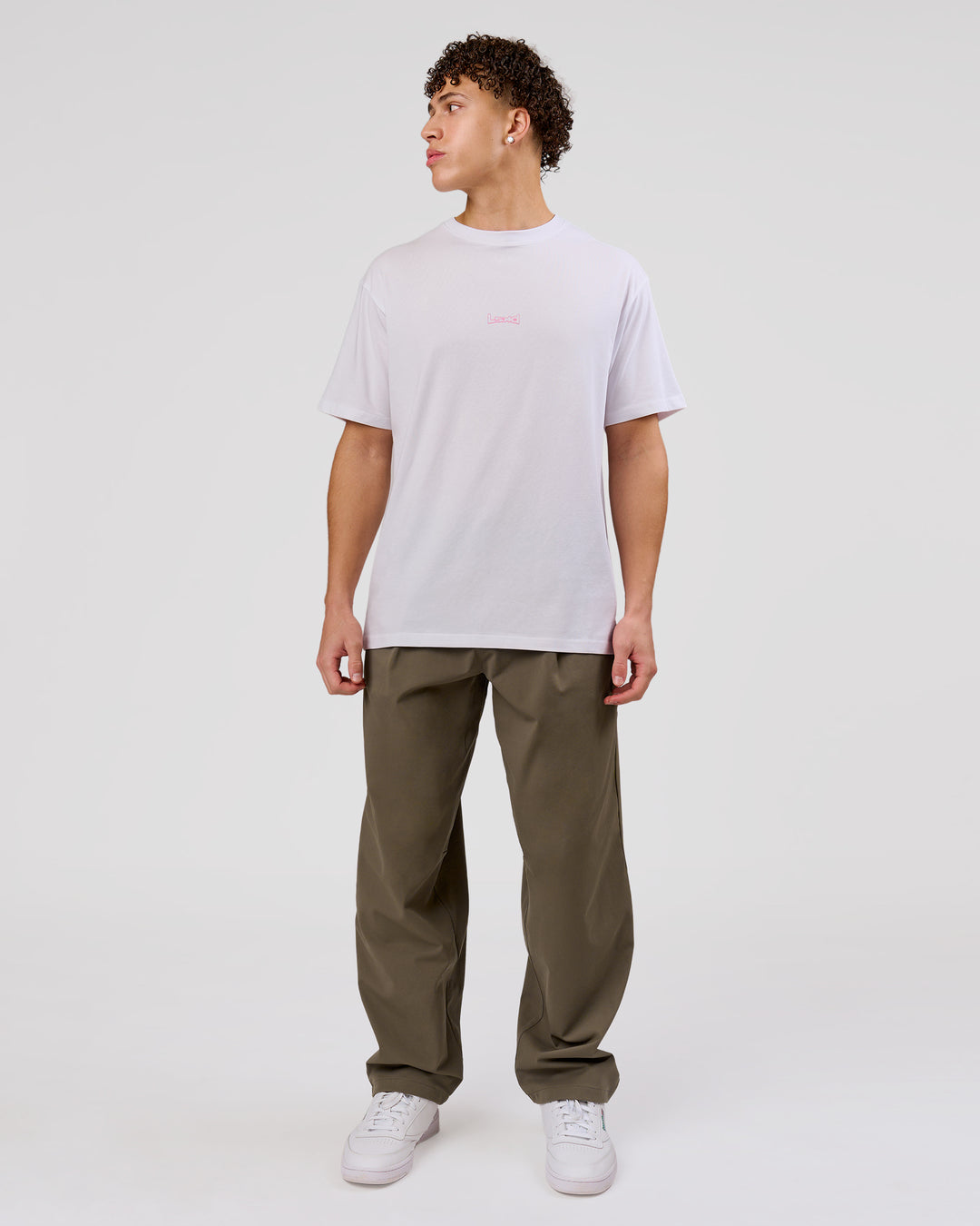 Man wearing Magma FLXCotton Oversize Tee  - White-Pink Rose | Model:Leandro | Size:M - view 10