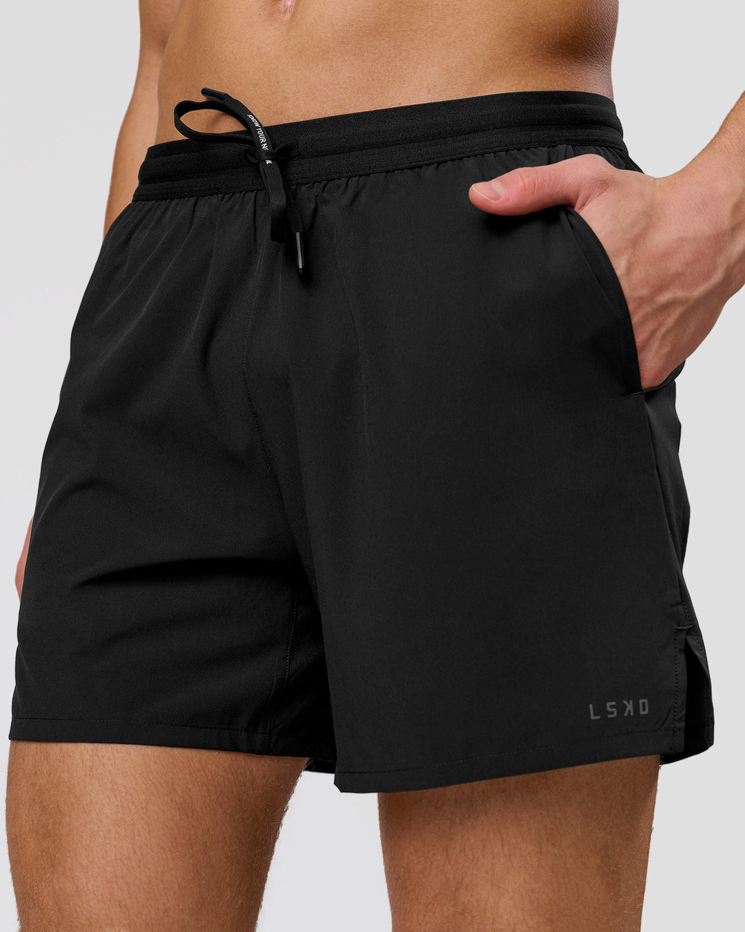 Man wearing Movember x LSKD Pace 5" Lined Running Short - Black | Model:Leandro | Size:M - view 2