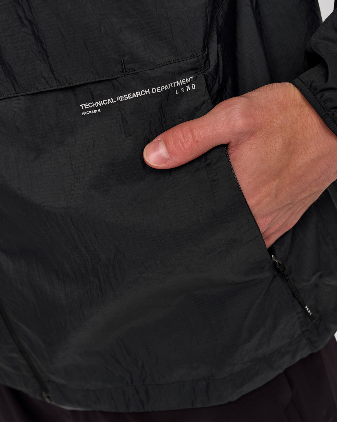 Man wearing Pace+ Lightweight Running Jacket - Black | Model:Leandro | Size:M - view 5