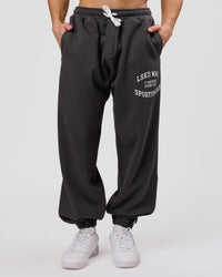 Man wearing Playbook Baggy Cuffed Track Pant - Onyx-Off White | Model:Leandro | Size:M | Thumbnail Index: 0