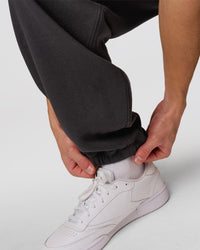 Man wearing Playbook Baggy Cuffed Track Pant - Onyx-Off White | Model:Leandro | Size:M | Thumbnail Index: 15