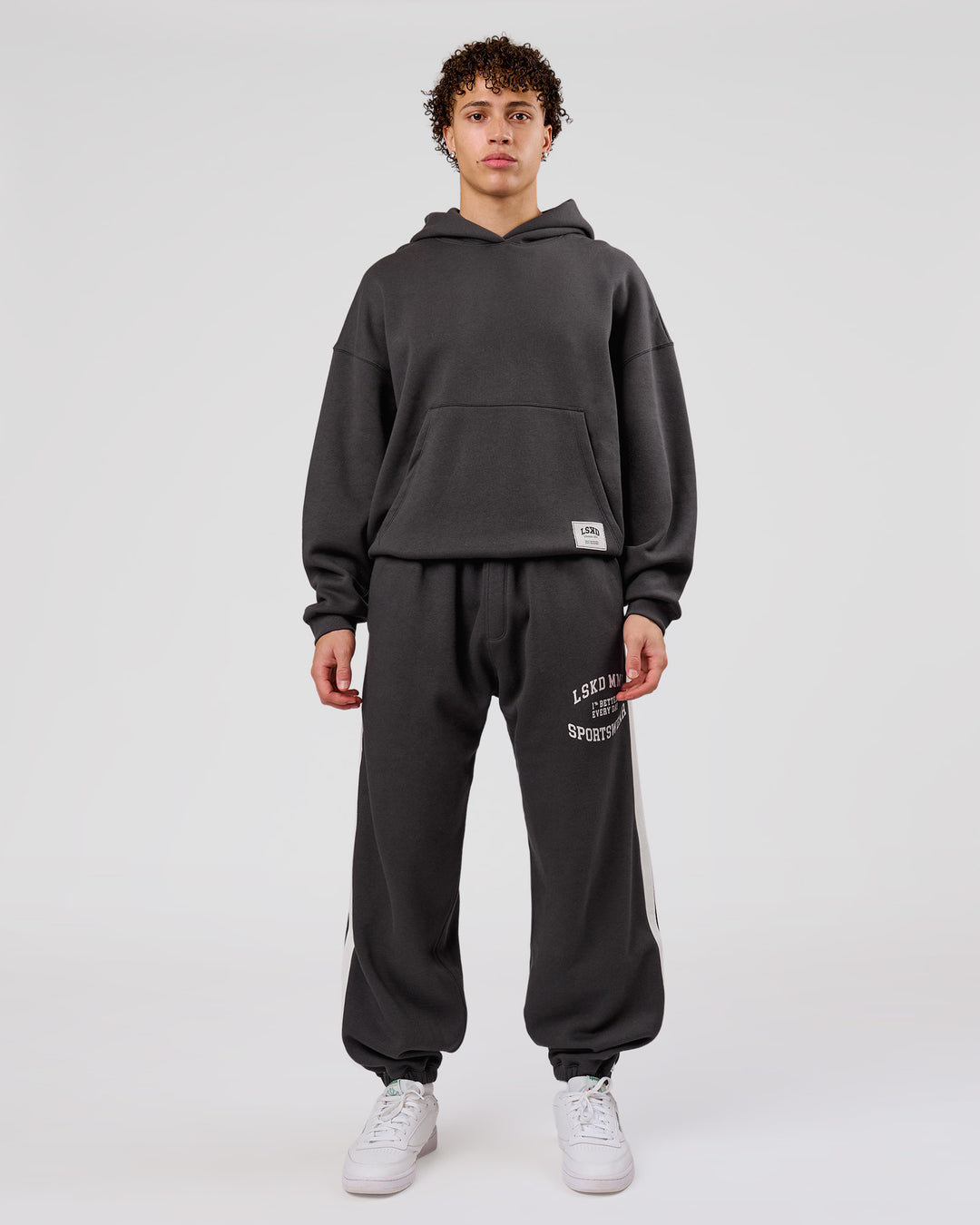 Man wearing Playbook Baggy Cuffed Track Pant - Onyx-Off White | Model:Leandro | Size:M - view 18
