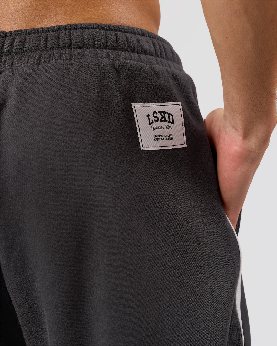 Man wearing Playbook Baggy Cuffed Track Pant - Onyx-Off White | Model:Leandro | Size:M - view 20