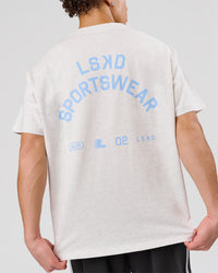 Man wearing Playbook Heavyweight Oversized Tee - Silver Marl-Open Air | Model:Leandro | Size:M | Thumbnail Index: 2