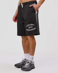 Man wearing Playbook Varsity Fleece Shorts - Onyx-Off White | Model:Leandro | Size:M | Thumbnail Index: 2