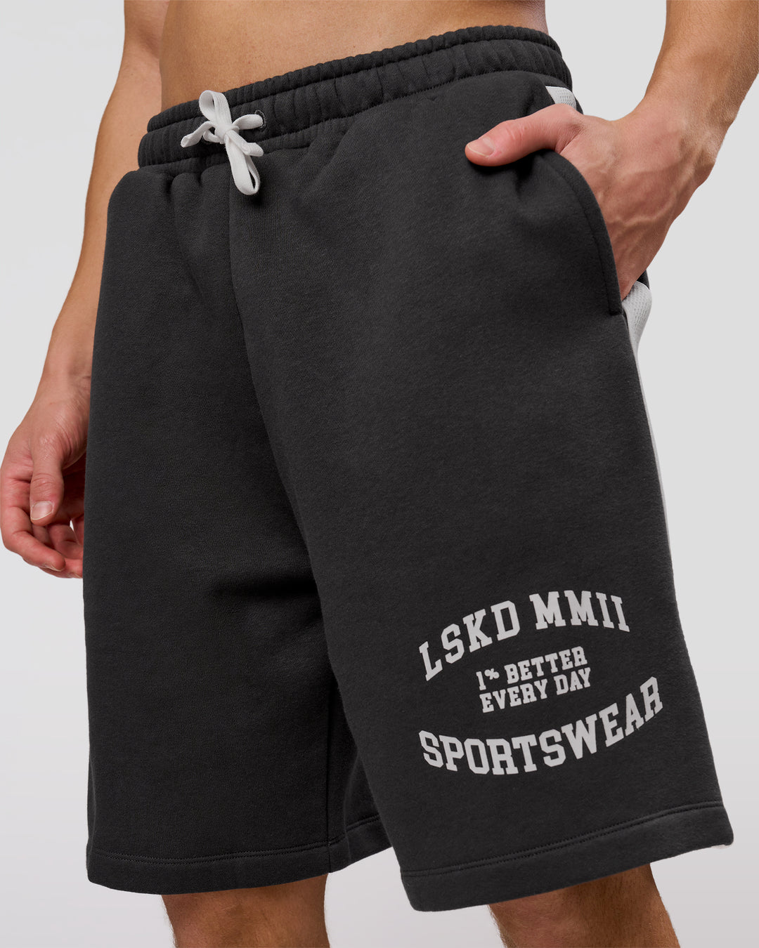 Man wearing Playbook Varsity Fleece Shorts - Onyx-Off White | Model:Leandro | Size:M - view 5