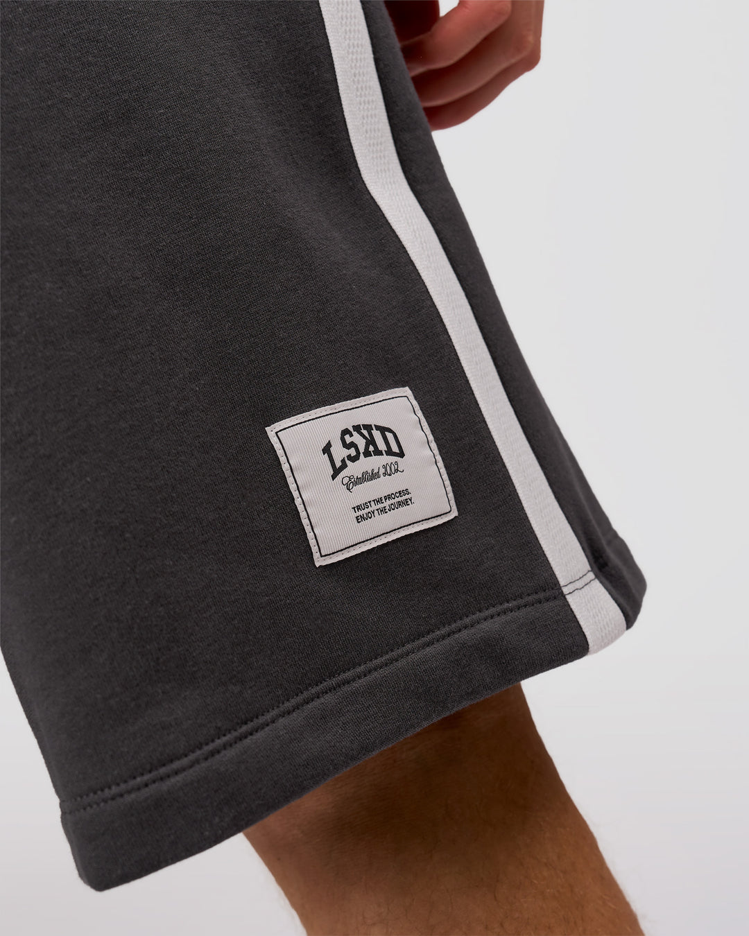 Man wearing Playbook Varsity Fleece Shorts - Onyx-Off White | Model:Leandro | Size:M - view 11