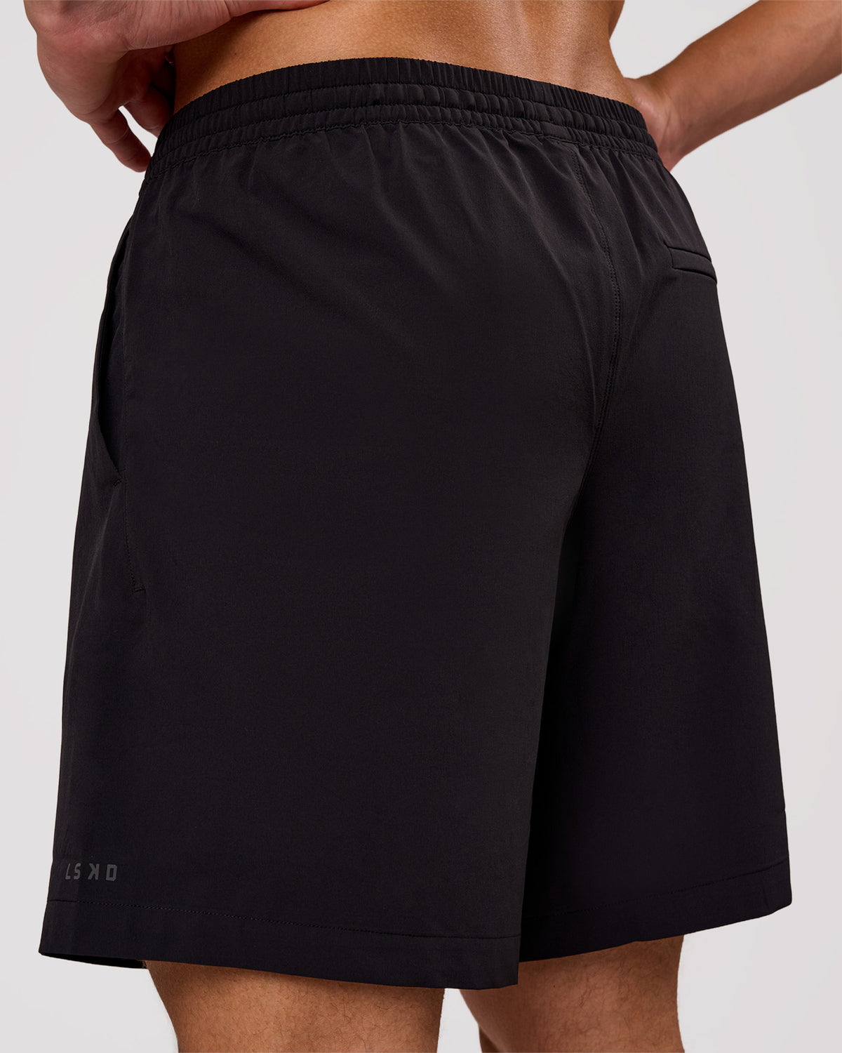 Man wearing Rep Movement 7" Training Short - Black | Model:Leandro | Size:M - view 2