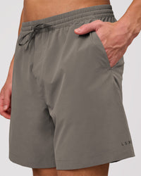 Man wearing Rep Movement 7" Training Short - Storm Front | Model:Leandro | Size:M | Thumbnail Index: 0