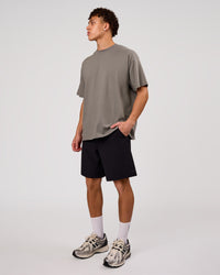 Man wearing Shadow Mark Heavyweight Oversized Tee - Storm Front-Onyx | Model:Leandro | Size:M | Thumbnail Index: 7