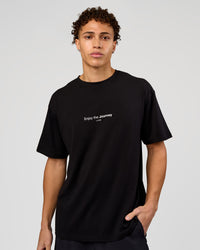 Man wearing VS1 Enjoy The Journey FLXCotton Oversize Tee - Black | Model:Leandro | Size:M | Thumbnail Index: 2