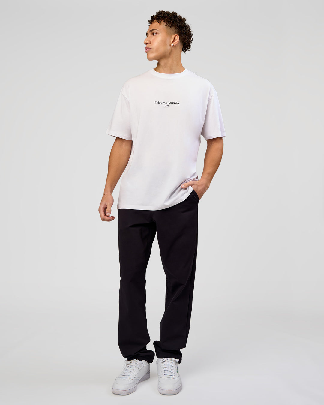 Man wearing VS1 Enjoy The Journey FLXCotton Oversize Tee - White | Model:Leandro | Size:M - view 8