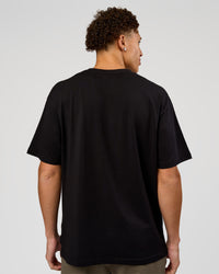 Man wearing VS6 1% Better FLXCotton Oversize Tee - Black | Model:Leandro | Size:M | Thumbnail Index: 13