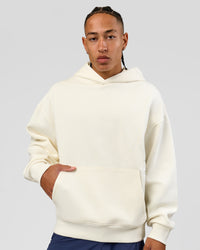 Man wearing Greatest of All Time Heavyweight Oversized Hoodie - Off White | Model:Malebo | Size:M | Thumbnail Index: 8