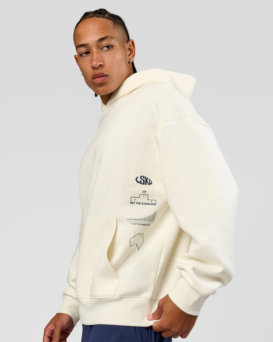 Man wearing Greatest of All Time Heavyweight Oversized Hoodie - Off White | Model:Malebo | Size:M - view 4