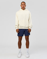Man wearing Greatest of All Time Heavyweight Oversized Hoodie - Off White | Model:Malebo | Size:M | Thumbnail Index: 15