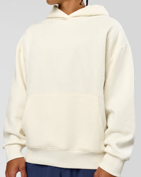 Man wearing Greatest of All Time Heavyweight Oversized Hoodie - Off White | Model:Malebo | Size:M | Thumbnail Index: 19