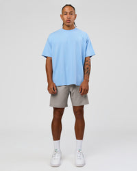 Man wearing Strong is Beautiful Heavyweight Oversized Tee - Open Air | Model:Malebo | Size:M | Thumbnail Index: 14