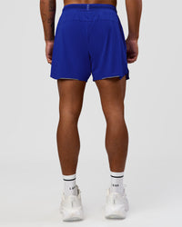 Man wearing UltraAir 5" Lined Performance Short  - Electric Indigo | Model:Malebo | Size:M | Thumbnail Index: 7