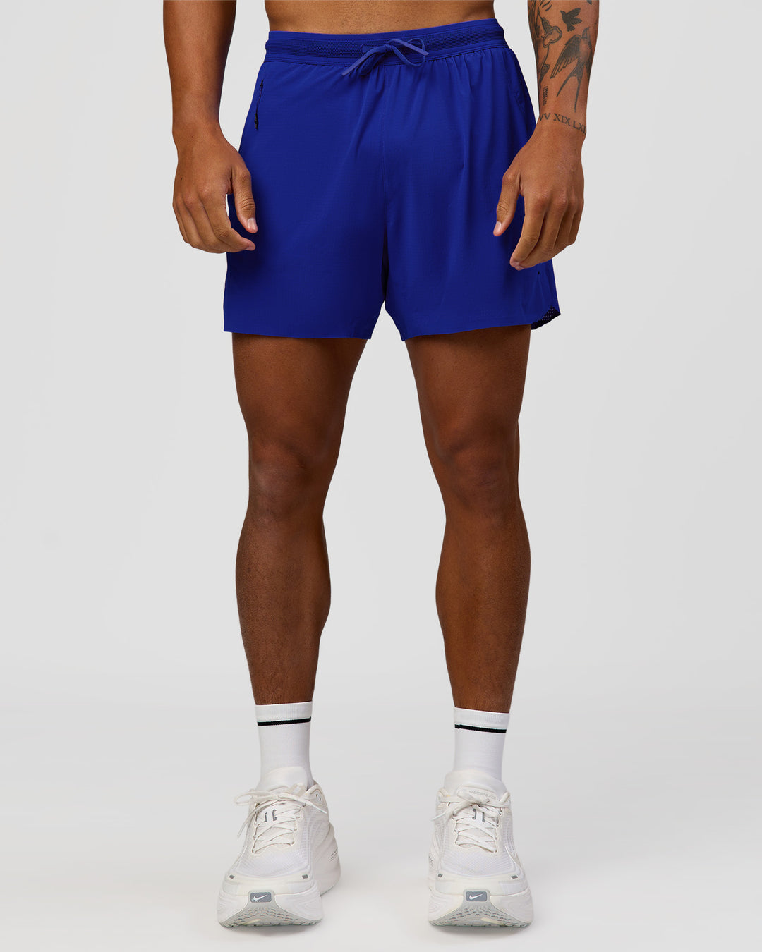 Man wearing UltraAir 5" Lined Performance Short  - Electric Indigo | Model:Malebo | Size:M - view 10