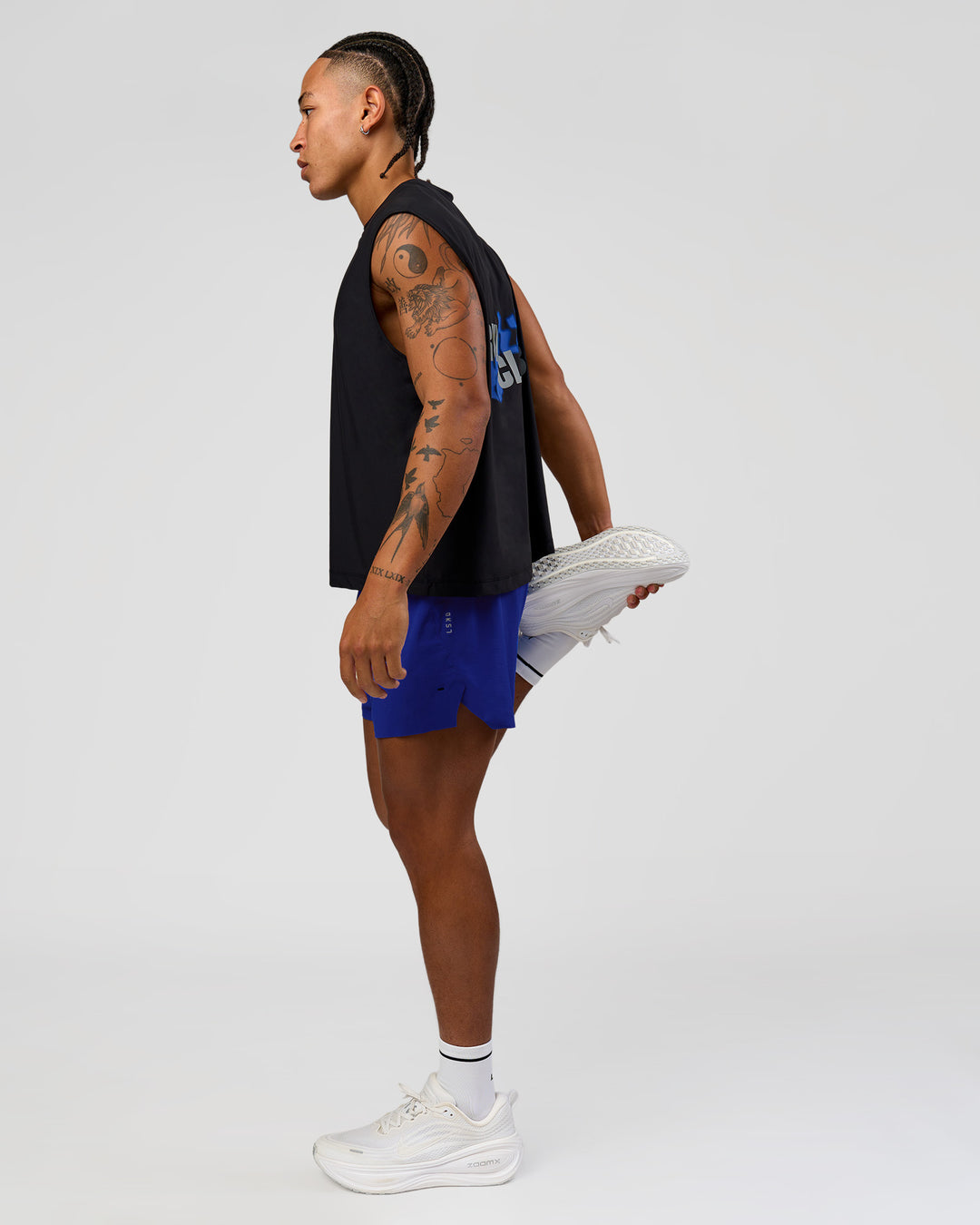 Man wearing UltraAir 5" Lined Performance Short  - Electric Indigo | Model:Malebo | Size:M - view 5