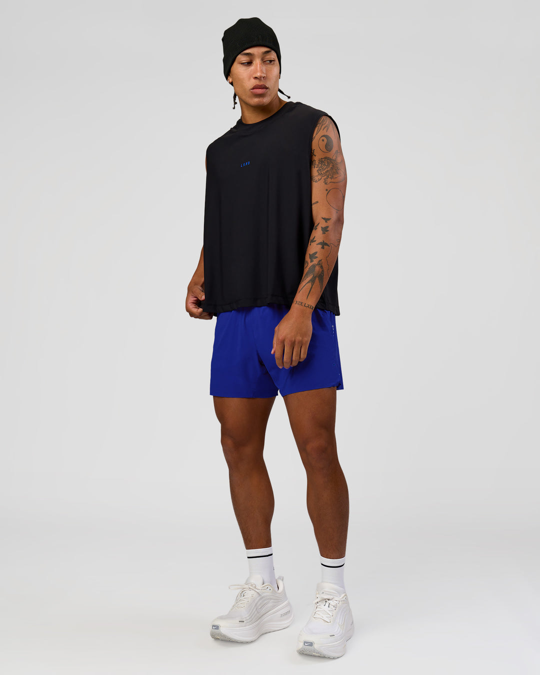 Man wearing UltraAir 5" Lined Performance Short  - Electric Indigo | Model:Malebo | Size:M - view 6