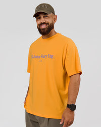 Man wearing VS6 1% Better Fathers Day FLXCotton Oversized Tee - Warm Apricot | Model:Jordan | Size:XL | Thumbnail Index: 7
