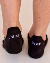 Studio image of Accelerate Performance Ankle Socks - Black-White | Thumbnail Index: 1