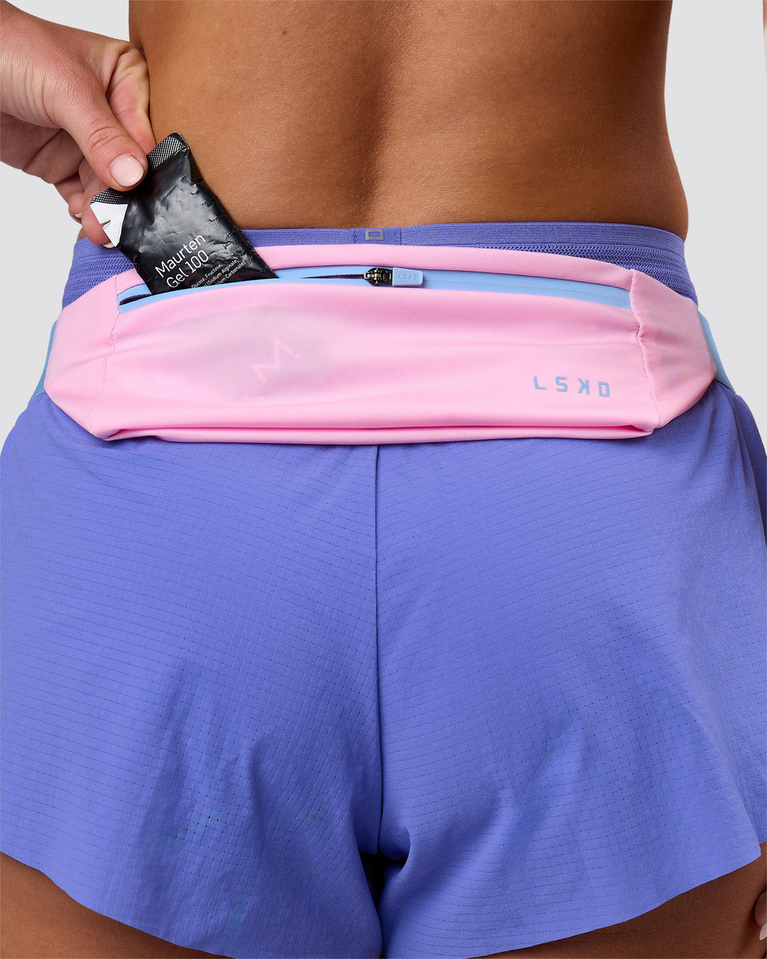 Studio image of Accelerate Run Belt - Pink Rose-Open Air - view 1