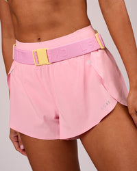Studio image of Accelerate Run Belt - Lemon-Pink Rose | Thumbnail Index: 1