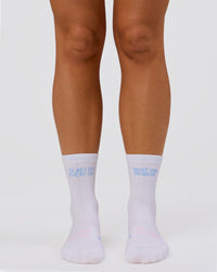 Studio image of Flow Performance Quarter Socks - White-Open Air | Thumbnail Index: 0