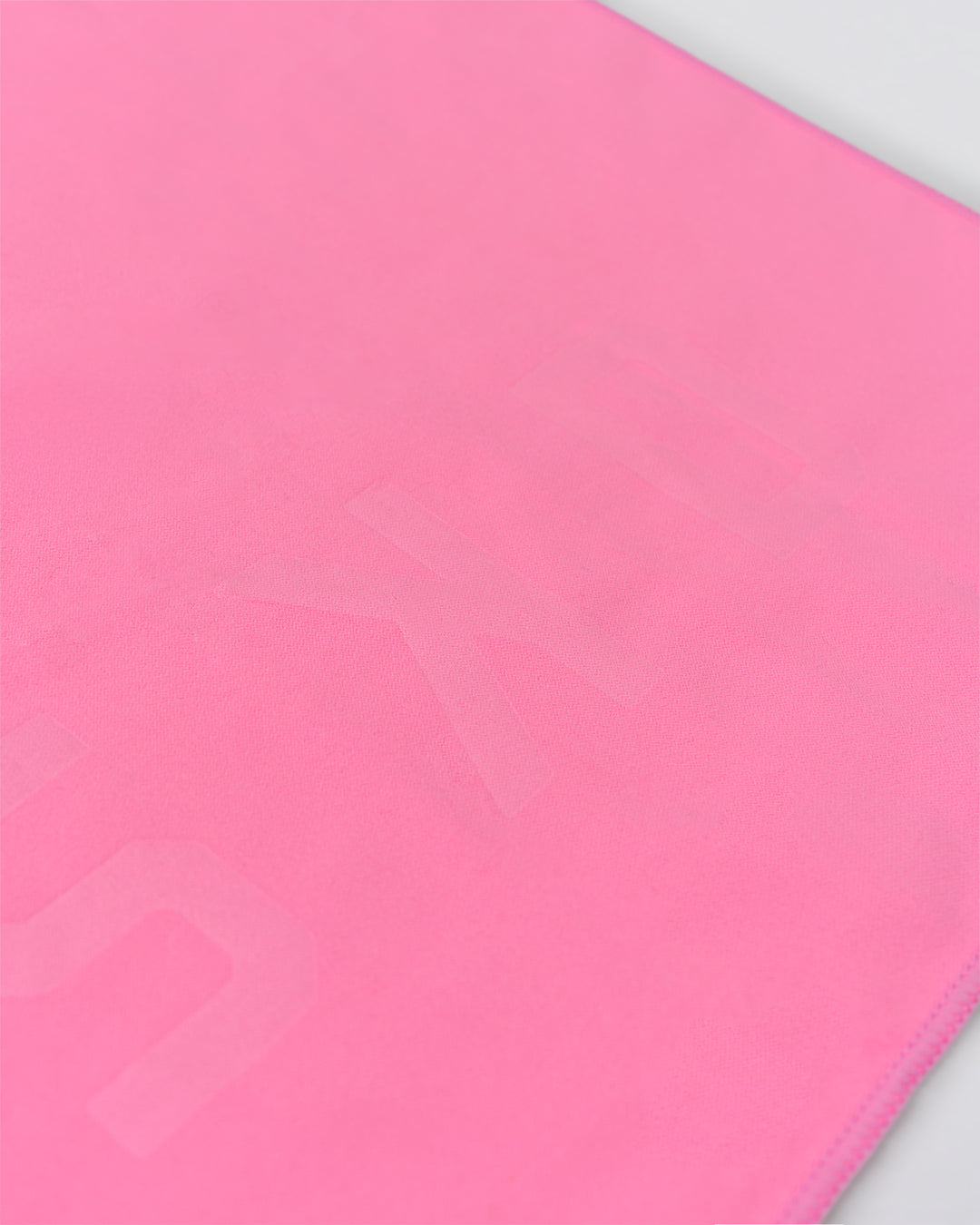 Studio image of Perform Microfibre Lightweight Towel Medium - Pink Rose - view 3