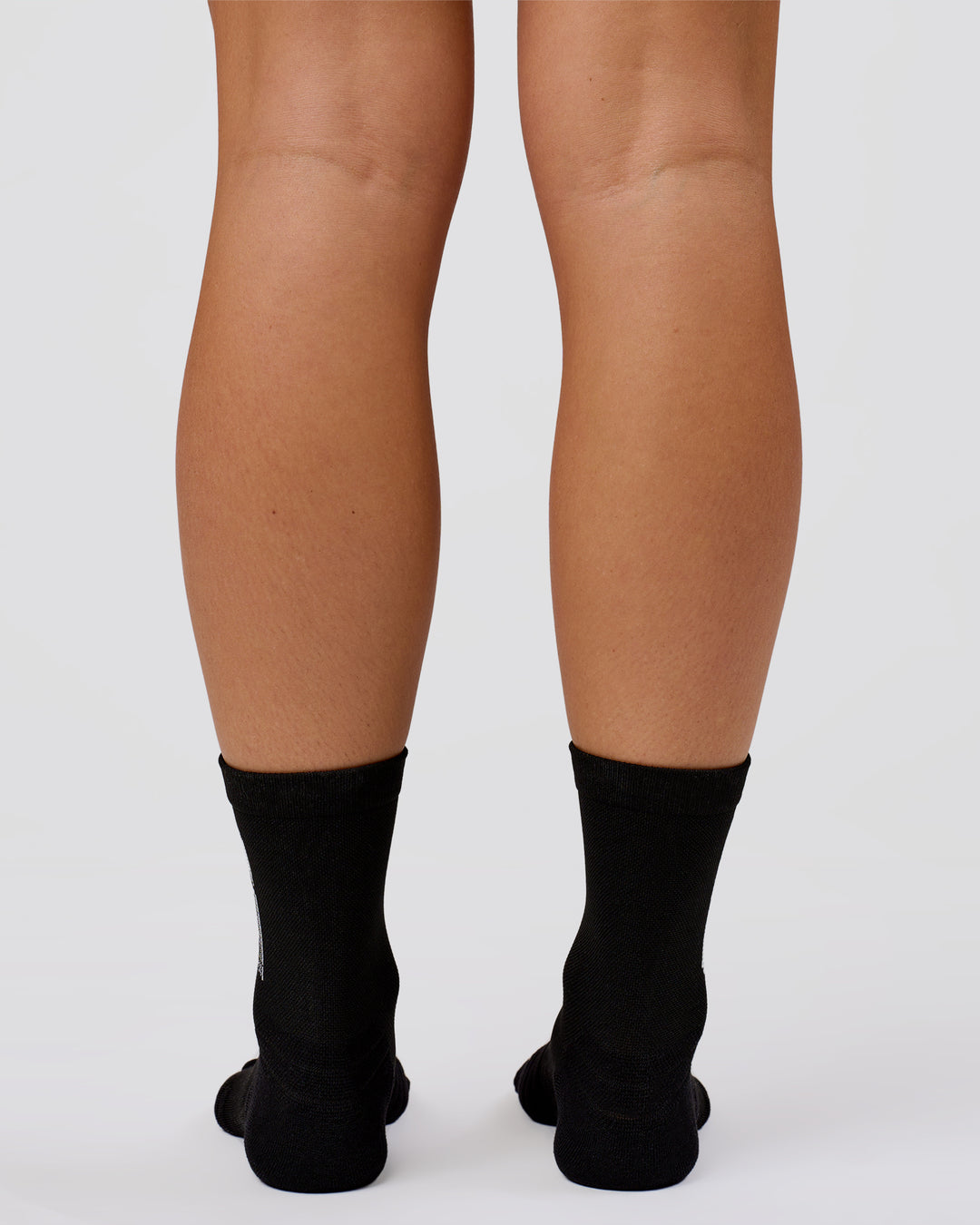 Studio image of Power Performance Quarter Socks - Black-White - view 4