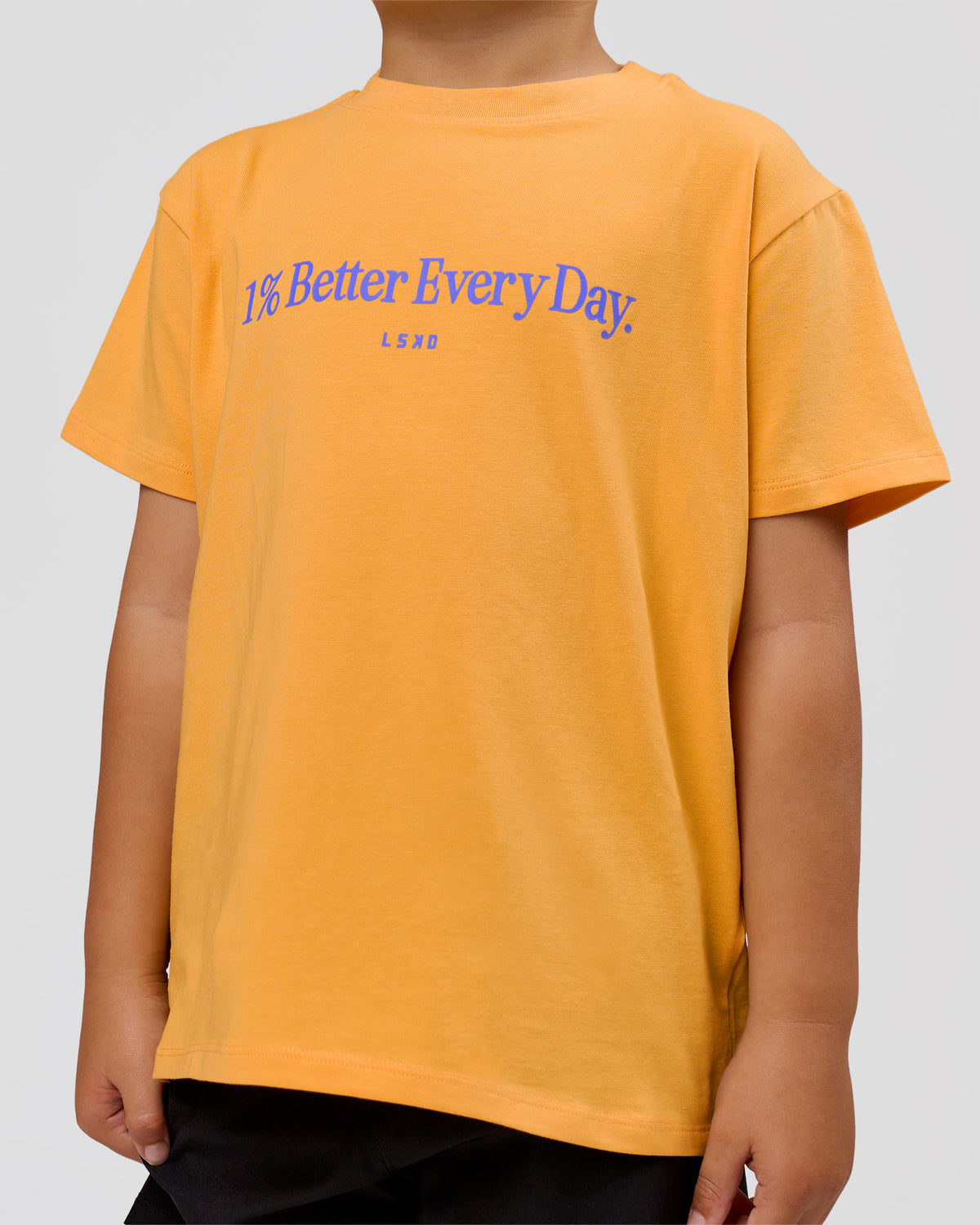 Studio image of VS6 1% Better Kids FLXCotton Tee - Warm Apricot